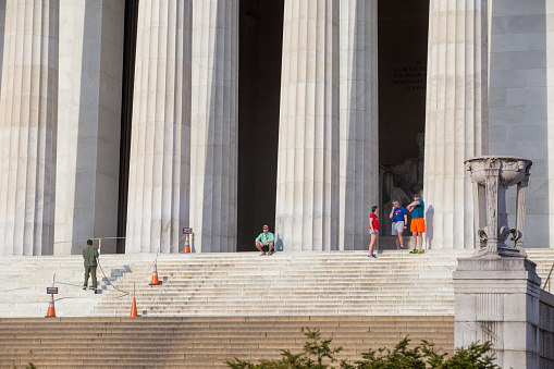 Spring, 2016 - Washington DC, USA - People stand at the columns of the Lincoln Memorial in Washington DC