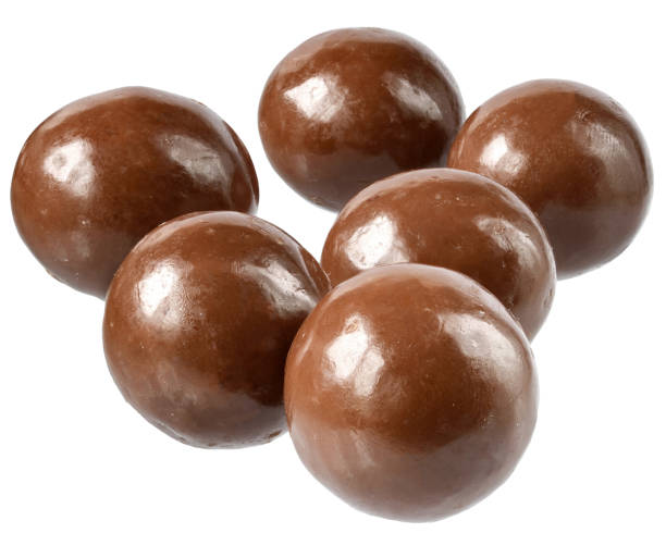 istock Chocolate balls close up isolated 1253227653