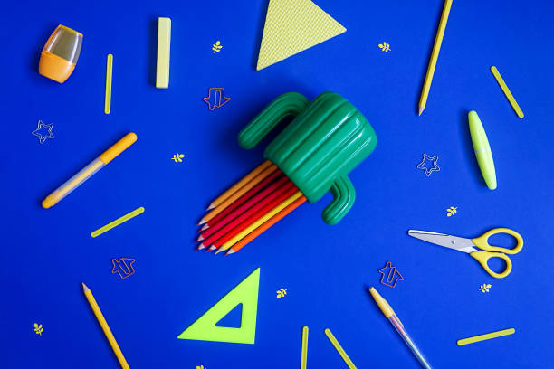 istock Stationery on blue. Bright flat lay. 1253231104