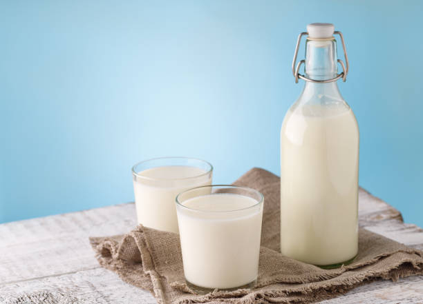 istock Milk. Bottle and glass with milk. 1253231554