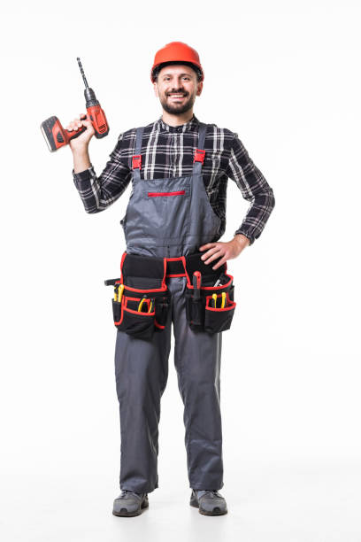 istock Handyman with drill isolated on white background 1253232571