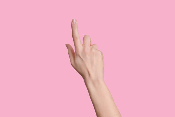 istock Isolated female light hand touching or pointing at something. Isolated. 1253232814
