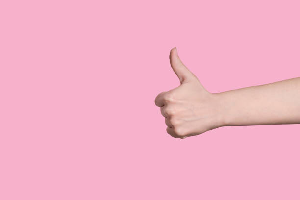 istock Thumb up close up, gesture, recommendation about a good choice 1253232992