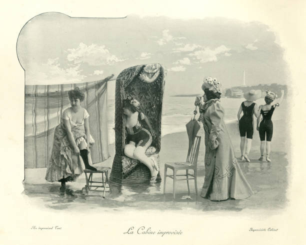 Women changing into bathing cosutme at the beach behind blanket Antique photomontage photograph Women changing into cosutme at the beach behind a blanket, 19th Century victorian swimwear stock pictures, royalty-free photos & images