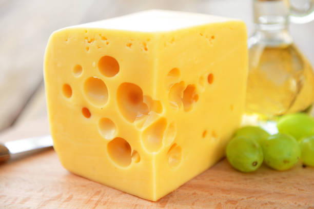 piece of cheese piece of cheese portion cut out cheese part of stock pictures, royalty-free photos & images