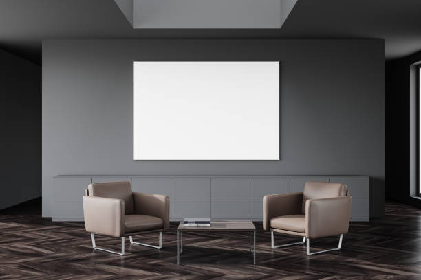 istock Grey office waiting room, armchairs and poster 1253236036