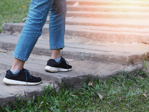 istock People walking on concrete stair 1253237994