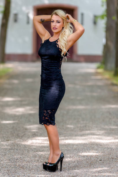 istock Blonde Model outside enjoying a day in the park 1253238232