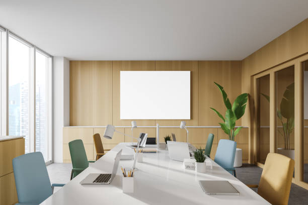 istock Wooden open space office with poster 1253238424