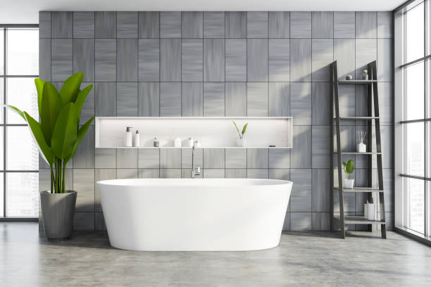 istock Gray wooden bathroom interior with tub 1253238467