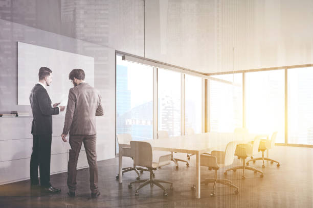 istock People in white panoramic meeting room corner 1253239296