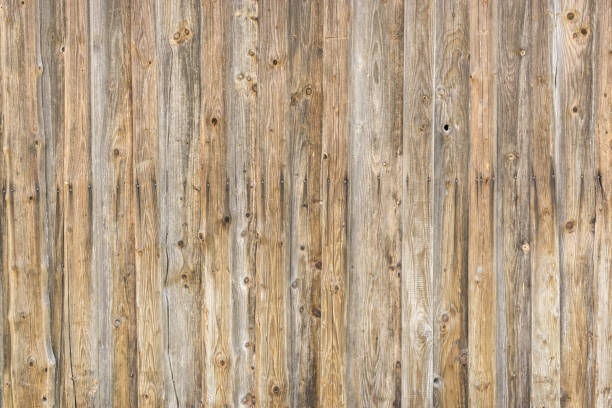 Natural brown barn wood wall. Wall texture background pattern. stock photo