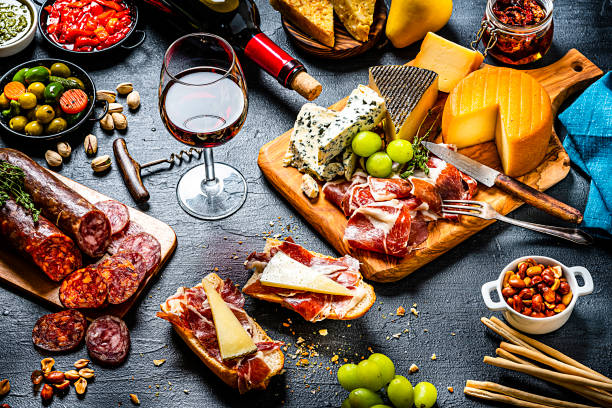 istock Delicius appetizer and wine on dark background. 1253245436