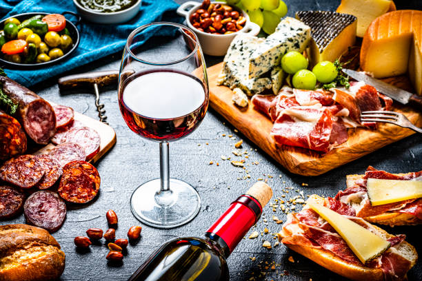 istock Delicius appetizer and wine on dark background. 1253245490