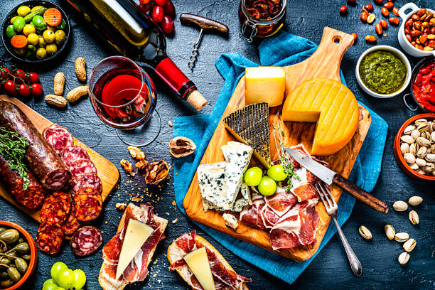 istock Delicius appetizer and wine on dark background. 1253245503