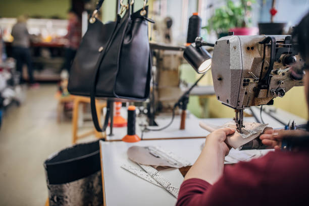 istock One mature woman working on sewing machine in workshop 1253246266