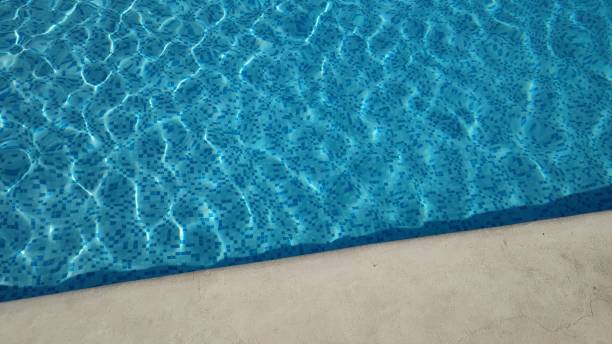 istock blue pool water and clear curb 1253246985