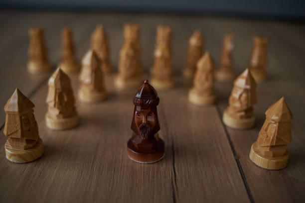 istock moving chess figure success play 1253249100