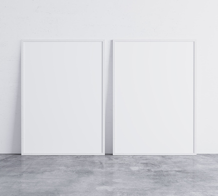 Set of 2 white vertical modern frames A3, A4, frame mock up on white wall standing on gray floor. Poster mock up. Minimal design. 3D render. Stock photo