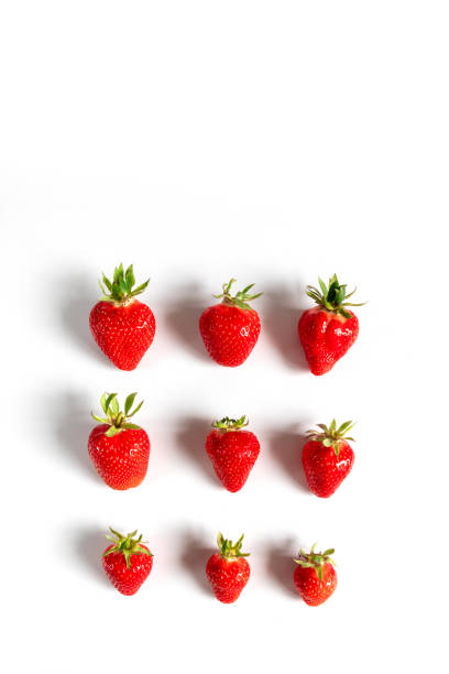 istock Organic delicious strawberry berries seamless pattern on grey background, top view, flat lay. Summer composition, minimal style 1253249463