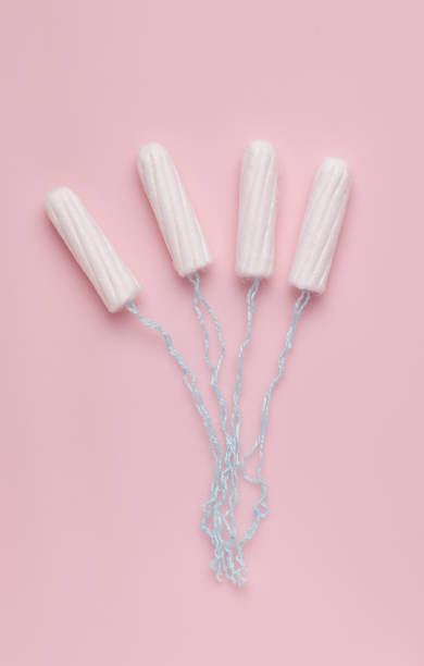 istock Protection concept for menstruation / tampons on a pink background. vertical photo 1253253169