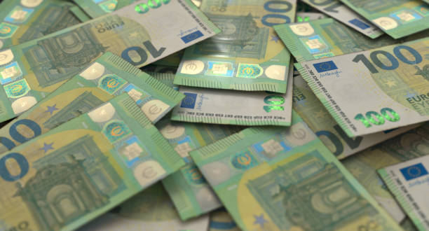 istock Scattered Euro Banknote Pile 1253253326