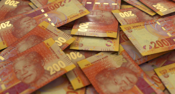 istock Scattered South African Rand Banknote Pile 1253254416