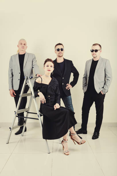 istock Music band posing for poster 1253258695