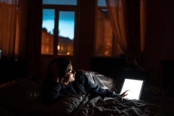 istock Close up to view woman's hands hold tablet with empty screen. 1253259257