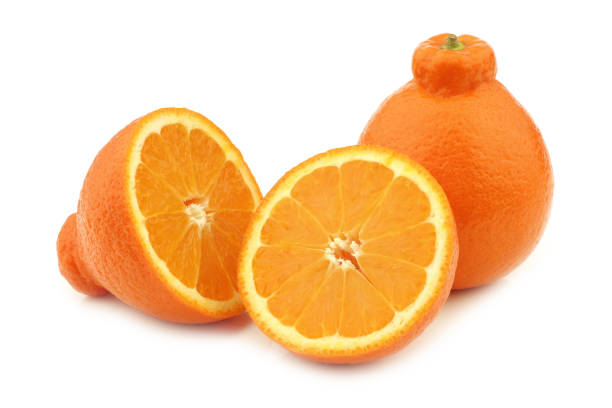 istock one fresh minneola and a cut one 1253259262