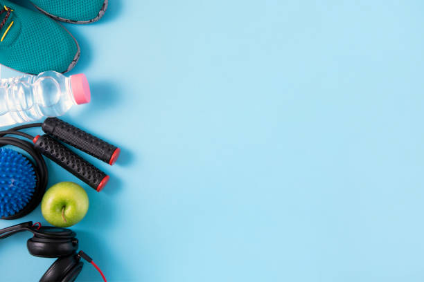 istock Sports Equipment and Accessories on Blue Background 1253261507