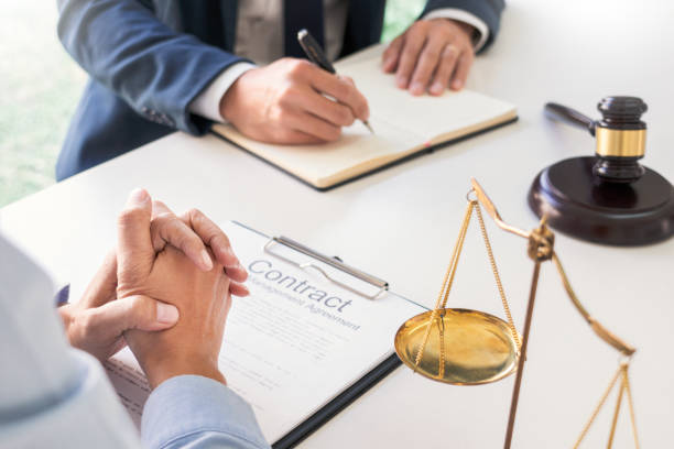 istock Midsection Of Lawyers Working In Office 1253265021
