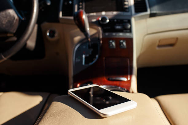 smart phone phone on the car seat dashboard. Lifestyles photo in car. Different views. Without hand, phone.