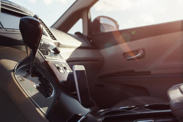 smart phone phone on the car seat dashboard smart phone phone on the car seat dashboard. Lifestyles photo in car. Different views. Without hand, phone. leather care stock pictures, royalty-free photos & images