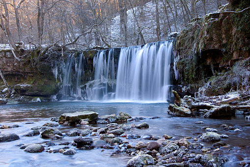 Sgwd Ddwli Uchaf  or  Upper Gushing Falls on the Fechan River in the Brecon Beacons National Park in winter