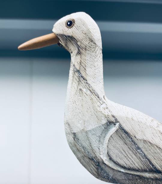 istock Abstract white wooden pigeon 1253276098