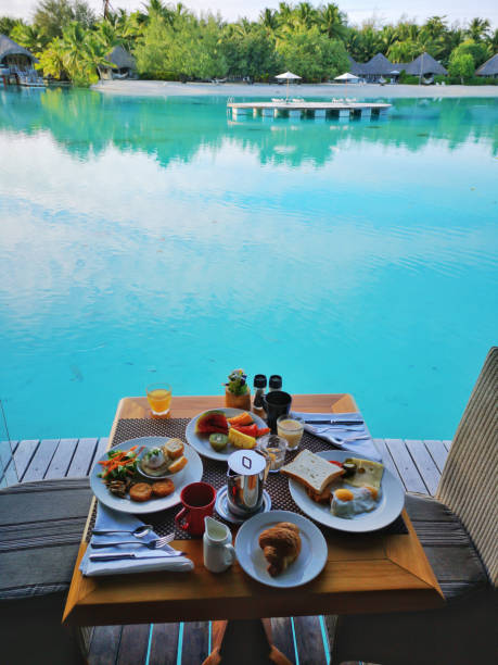 istock table with breakfast on terrace with view upon the water 1253276458