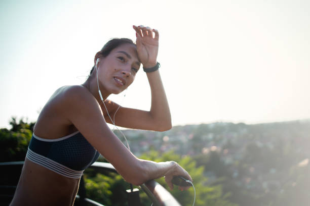 istock Young women resting from hard exercise 1253278370