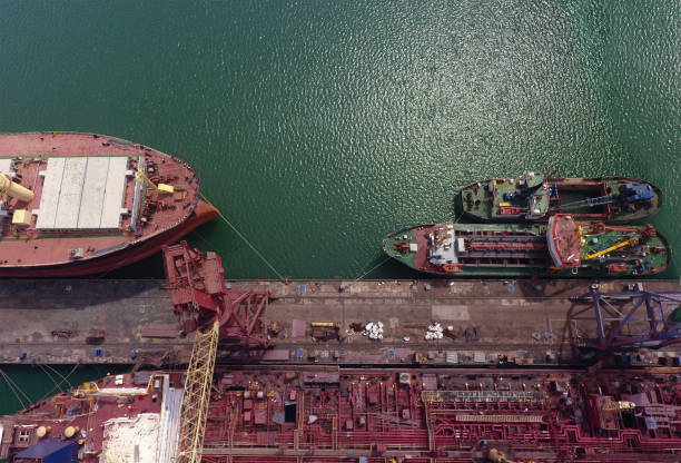 Industrial ships loading goods on the South China sea off Hong Kong coast, one of the busiest ports in the world, in the three categories of shipping movements, cargo handled and passengers carried.