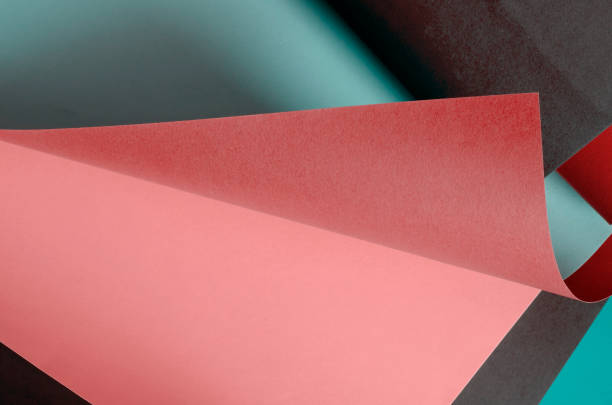 istock Multi-colored sheets of colored paper abstract background. 1253282495