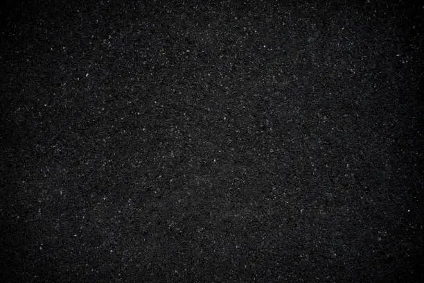 Photo of Black asphalt floor or road texture background.