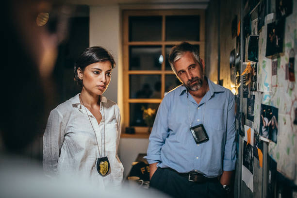 Detectives working on a case in the office