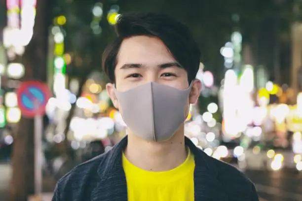 Photo of Portrait of Asian man wearing Protective Face Mask