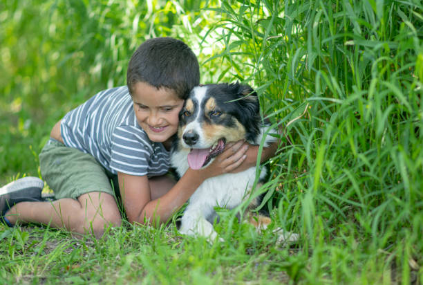 istock Little boy and his dog 1253291754