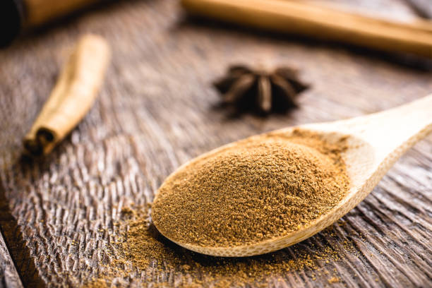 istock bark cinnamon cut into small piles. Cinnamon, culinary spice. 1253292834