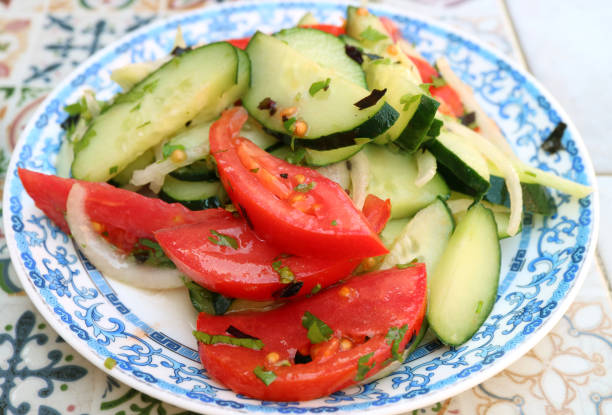 istock Georgian Style Cucumber Tomato and Onion Salad 1253294178