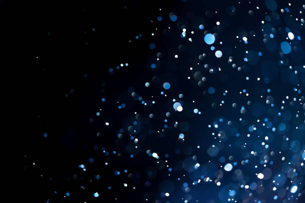 istock Dark blue abstract backgrounds with bokeh 1253297174