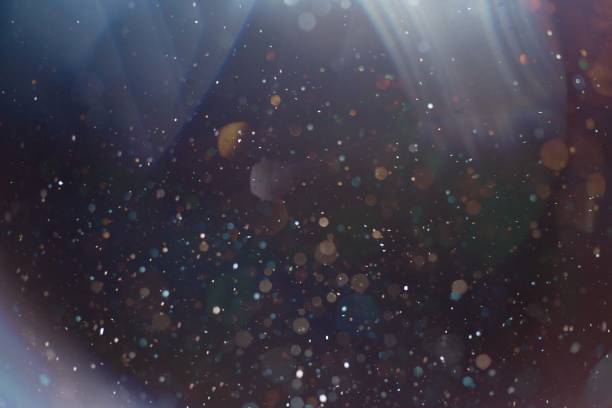 istock Colorful Layers of Snow Falling in the Light 1253298133
