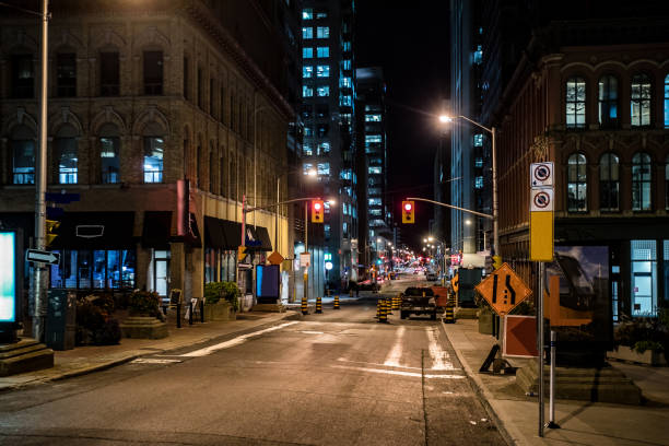 istock City Street Illuminated at Night 1253300459