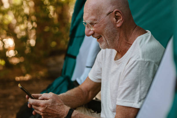 istock Staying connected to outside world from campsite 1253300463